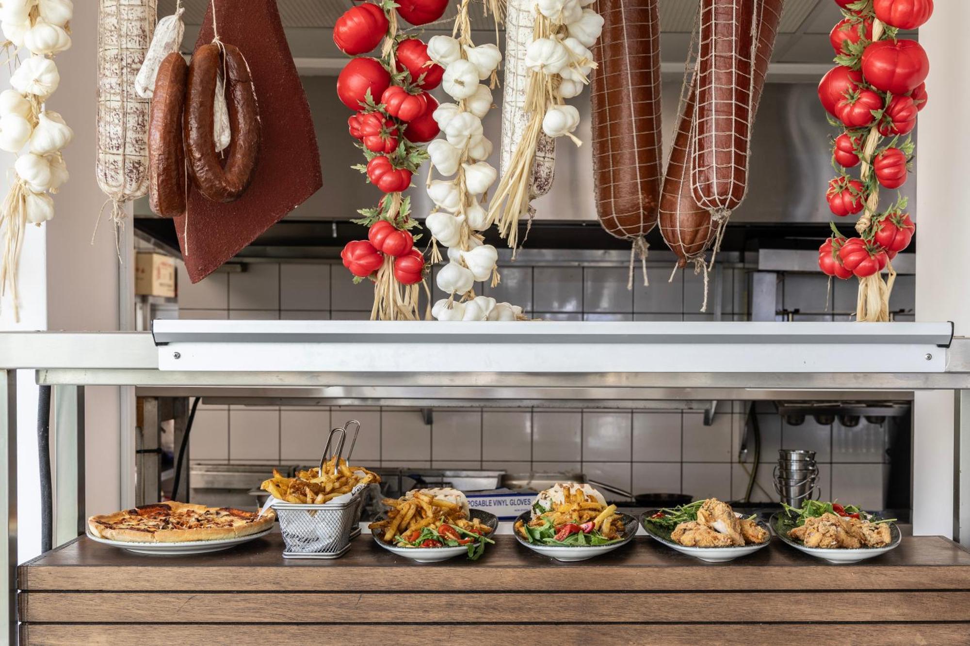 Ivi Mare - Designed For Adults By Louis Hotels Geroskipou Eksteriør billede A display of prepared tapas at a restaurant in Madrid
